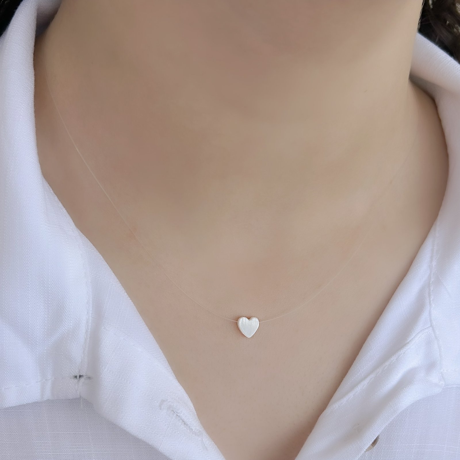 0068274 - GARGANTILHA NYLON MADRE PEROLA CORACAO 40 CM